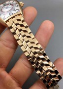 法穆兰5850型，18K玫瑰金表壳和表带（自动机械机芯，按动把头表盘的轮盘赌开始旋转，全套附件齐全